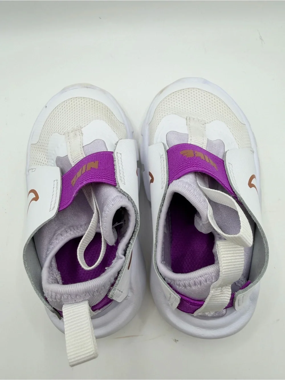 Nike Kids White Sneakers with Purple Strap and Gold Swoosh